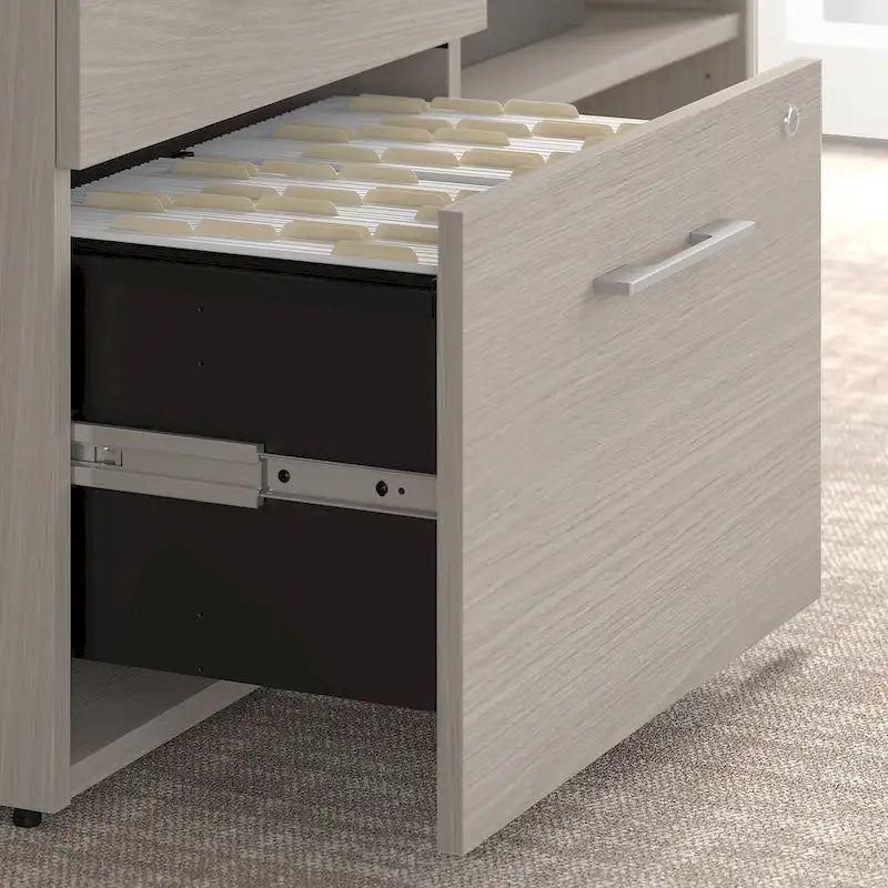 Meuble de rangement bas de bureau gris orageux à deux tiroirs, avec serrures et étagères ouvertes, support d'imprimante.