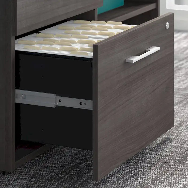 Meuble de rangement bas de bureau gris orageux à deux tiroirs, avec serrures et étagères ouvertes, support d'imprimante.