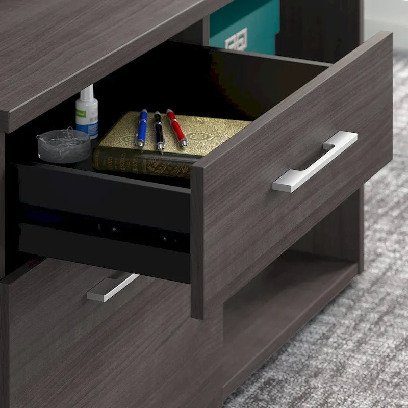 Meuble de rangement bas de bureau gris orageux à deux tiroirs, avec serrures et étagères ouvertes, support d'imprimante.