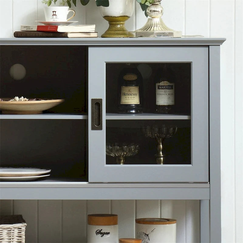 Buffet gris avec portes en verre trempé, étagères réglables et passe-câbles